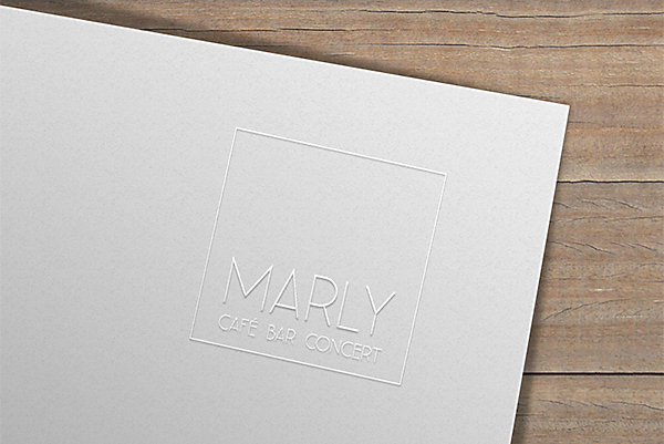 cafe-marly-logo-praegung-auf-weissem-papier